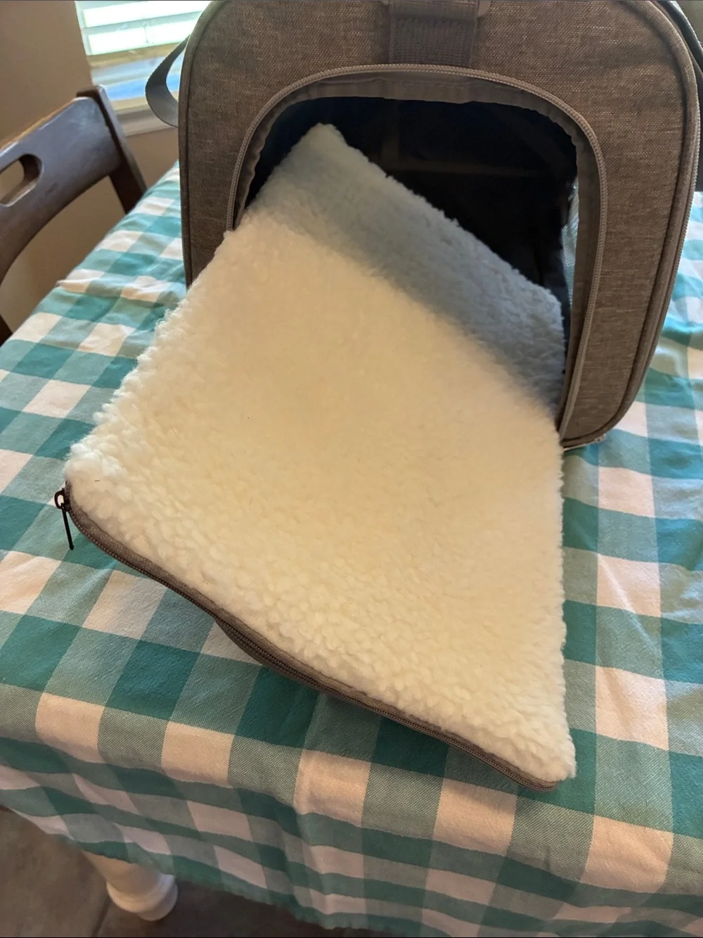 Gray cloth travel carrier for small dog